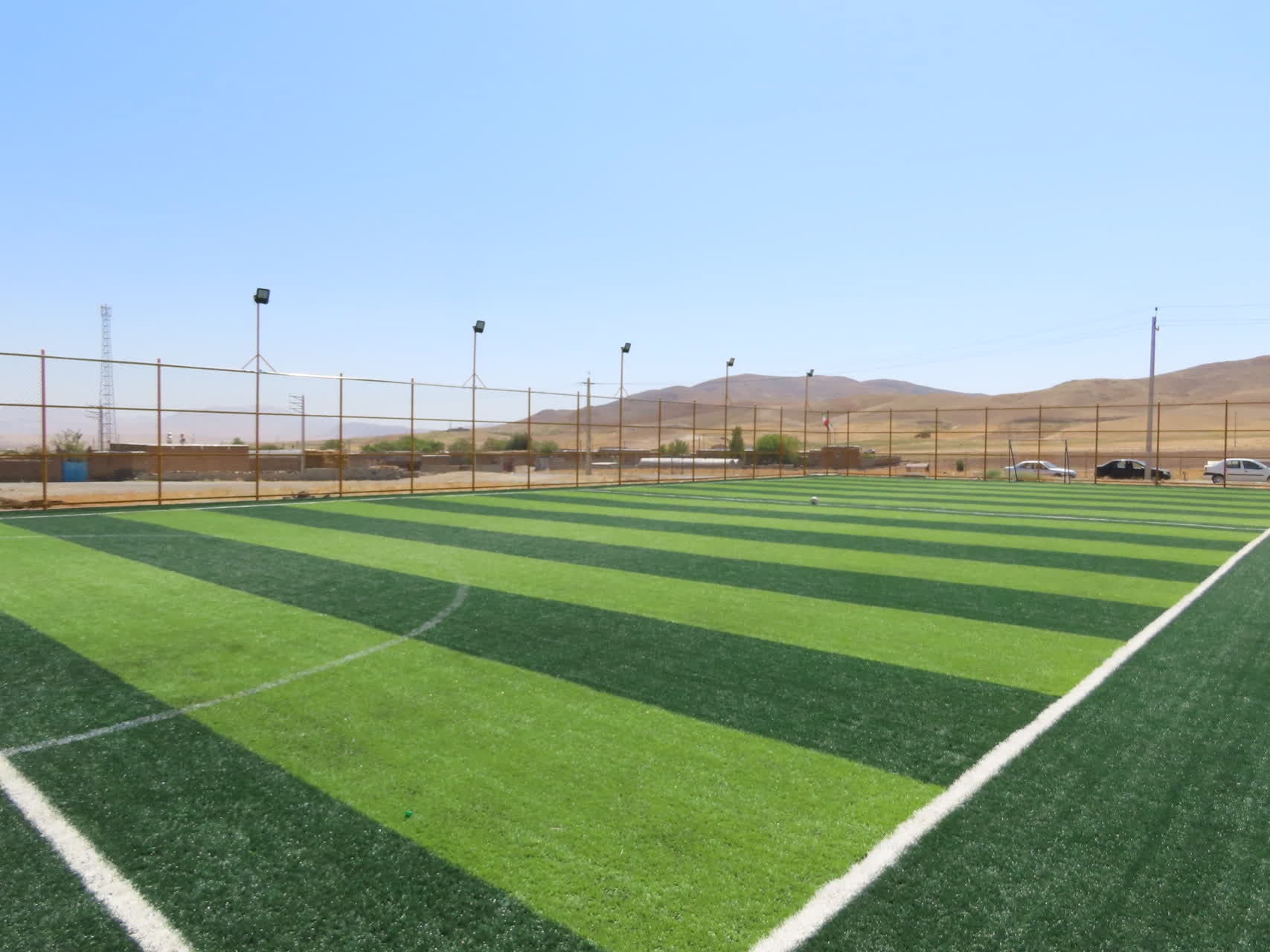 افتتاح فضای ورزشی روباز (چمن مصنوعی) روستای کامل آباد